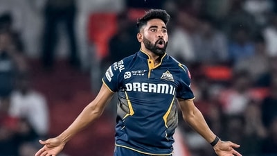 Gujarat Titans' Mohammed Siraj celebrates after taking the wicket of Sunrisers Hyderabad's Simarjeet Singh. (AFP) Gujarat Titans' Mohammed Siraj celebrates after taking the wicket of Sunrisers Hyderabad's Simarjeet Singh. (AFP)