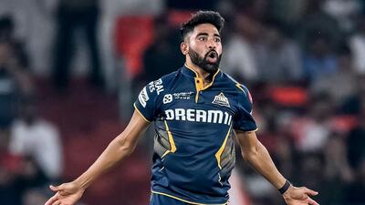 GT’s Mohammed Siraj celebrates after taking a wicket on Sunday. (AFP)