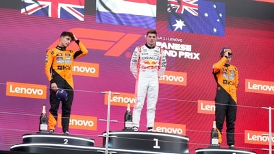 Red Bull driver Max Verstappen, center, second placed McLaren driver Lando Norris of Britain, left, and third place McLaren driver Oscar Piastri of Australia (AP) Red Bull driver Max Verstappen, center, second placed McLaren driver Lando Norris of Britain, left, and third place McLaren driver Oscar Piastri of Australia (AP)
