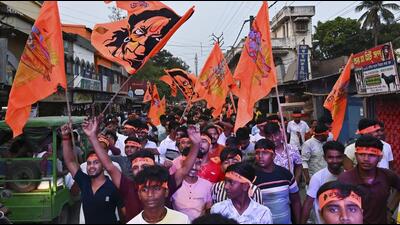 People take part in a religious procession on the occasion of Ram Navami, in Nadia, West Bengal, on Sunday. (PTI)
