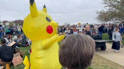 Protesters dressed lika a Pikachu during the Hands Off protest in Washington DC. (X)