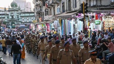 In the wake of the upcoming Ram Navami festival, Senior police officers of Paydhonie police station conducted a route march in Bhendi Bazaar, Paydhonie area in South Mumbai, with Maharashtra Security Force and Home Guards. Mumbai, India. Apr 05, 2025. (Raju Shinde/HT Photo) In the wake of the upcoming Ram Navami festival, Senior police officers of Paydhonie police station conducted a route march in Bhendi Bazaar, Paydhonie area in South Mumbai, with Maharashtra Security Force and Home Guards. Mumbai, India. Apr 05, 2025. (Raju Shinde/HT Photo)
