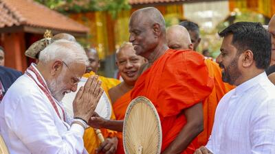 Prime Minister Narendra Modi with Sri Lankan President Anura Kumara Dissanayake and others during a visit to the Jaya Sri Maha Bodhi temple in the city of Anuradhapura, Sri Lanka. (PMO) Prime Minister Narendra Modi with Sri Lankan President Anura Kumara Dissanayake and others during a visit to the Jaya Sri Maha Bodhi temple in the city of Anuradhapura, Sri Lanka. (PMO)