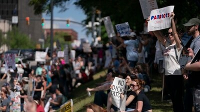 Demonstrators participate in a Hands Off protest at the statehouse on April 5, 2025 in Columbia, South Carolina. (Getty Images via AFP)