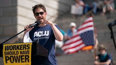 Demonstrators stage Hands Off protest at the statehouse on April 5, 2025 in Columbia, South Carolina. This is a protests against Trump administration policies and Elon Musk's Department of Government Efficiency (DOGE) are being held nationwide in what organizers are calling a National Day of Action. (Getty Images via AFP)