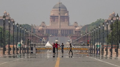 Heatwave in Delhi: Visitors take a walk on Kartavya Path as a mirage appears on a hot summer day, in New Delhi, Sunday, April 6, 2025. (PTI) Heatwave in Delhi: Visitors take a walk on Kartavya Path as a mirage appears on a hot summer day, in New Delhi, Sunday, April 6, 2025. (PTI)