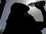 The Met declares a heatwave when the maximum temperature is at least 40 degrees Celsius (°C), and is also 4.5°C or more above normal. Alternatively, any day when the maximum crosses 45°C or higher also qualifies as a heatwave. A “severe heatwave” is one where the maximum is 6.5°C above normal. (File Photo by Shammi MEHRA / AFP) The Met declares a heatwave when the maximum temperature is at least 40 degrees Celsius (°C), and is also 4.5°C or more above normal. Alternatively, any day when the maximum crosses 45°C or higher also qualifies as a heatwave. A “severe heatwave” is one where the maximum is 6.5°C above normal. (File Photo by Shammi MEHRA / AFP)