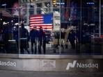 The Nasdaq MarketSite in New York, US, on Friday, April 4, 2025. The Nasdaq 100 plunged another 4%, putting it on course to close more than 20% below its February record in a rout whose swiftness is rivaled in recent years only by the pandemic meltdown in 2020. 
