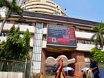 Mumbai: People walk past the Bombay Stock Exchange (BSE) building on Monday.