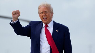 US President Donald Trump gestures as he disembarks Air Force One in Miami, Florida, US, April 3, 2025. (Reuters)