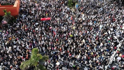 In an aerial view, protesters march in a 'Hands Off!' protest against the Trump administration on April 5, 2025 in Los Angeles, California. Protests against Trump administration policies and Elon Musk's Department of Government Efficiency (DOGE) are being held nationwide in what organizers are calling a National Day of Action. (Getty Images via AFP) In an aerial view, protesters march in a 'Hands Off!' protest against the Trump administration on April 5, 2025 in Los Angeles, California. Protests against Trump administration policies and Elon Musk's Department of Government Efficiency (DOGE) are being held nationwide in what organizers are calling a National Day of Action. (Getty Images via AFP)
