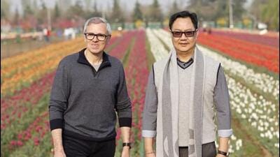 Jammu and Kashmir chief minister Omar Abdullah with Union parliamentary and minorities affairs minister Kiren Rijiju at the Tulip Garden in Srinagar on Sunday. (X)