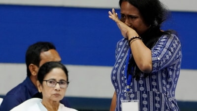 A teacher, who lost her job after a Supreme Court verdict invalidated the appointment of 25,753 teachers and other staff in state-run and state-aided schools in West Bengal, breaks down after speaking during an interaction with West Bengal chief minister Mamata Banerjee at Netaji Indoor Stadium in Kolkata on April 7, 2025. (PTI) A teacher, who lost her job after a Supreme Court verdict invalidated the appointment of 25,753 teachers and other staff in state-run and state-aided schools in West Bengal, breaks down after speaking during an interaction with West Bengal chief minister Mamata Banerjee at Netaji Indoor Stadium in Kolkata on April 7, 2025. (PTI)