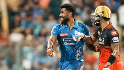 Royal Challengers Bengaluru's Virat Kohli and Mumbai Indians' Jasprit Bumrah, at the Wankhede Stadium on Monday. (PTI) Royal Challengers Bengaluru's Virat Kohli and Mumbai Indians' Jasprit Bumrah, at the Wankhede Stadium on Monday. (PTI)