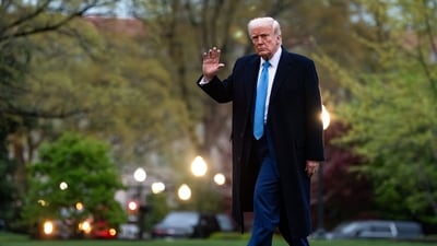 US President Donald Trump walks on the South Lawn of the White House after arriving on Marine One in Washington, DC, US, on Sunday, April 6, 2025. (Bloomberg) US President Donald Trump walks on the South Lawn of the White House after arriving on Marine One in Washington, DC, US, on Sunday, April 6, 2025. (Bloomberg)
