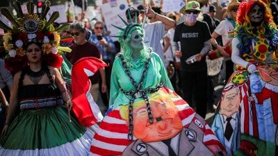 Demonstrators take part in a 'Hands Off!' protest against U.S. President Donald Trump and his adviser Elon Musk, in Los Angeles, California, U.S., April 5, 2025.  (REUTERS)