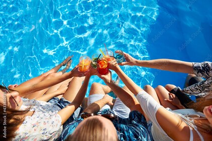 Pool party is all fun, but you need to take care of your hair afterwards with proper shampoo and conditioners. (Adobe Stock) Pool party is all fun, but you need to take care of your hair afterwards with proper shampoo and conditioners. (Adobe Stock)