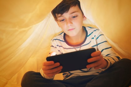Children now resort to playing games on phones rather than going outside. (Shutterstock) Children now resort to playing games on phones rather than going outside. (Shutterstock)