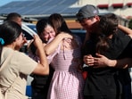 People get emotional as they express shock at the site where the roof of the Jet Set nightclub collapsed, in Santo Domingo, Dominican Republic, April 8, 2025. REUTERS/Erika Santelices TPX IMAGES OF THE DAY