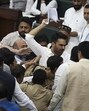Jammu and Kashmir MLAs raising slogans and arguing with each other during the budget session of the assembly in Jammu on Tuesday. (PTI Photo) Jammu and Kashmir MLAs raising slogans and arguing with each other during the budget session of the assembly in Jammu on Tuesday. (PTI Photo)