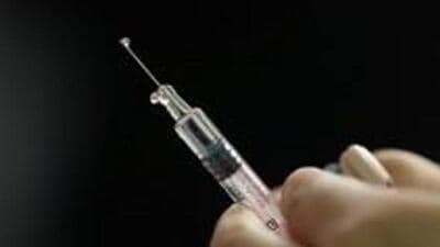 A nurse prepares a vaccine. (Reuters File Photo) A nurse prepares a vaccine. (Reuters File Photo)