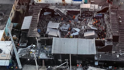Handout picture released by Prensa Servicio 911 showing an aerial view of the Jet Set nightclub after the collapse of its roof, in Santo Domingo, on April 8, 2025. Rescuers raced to find survivors Tuesday among the rubble of a Dominican Republic night club where at least 27 people died and more than 150 were hurt in an early-morning roof collapse. (AFP) Handout picture released by Prensa Servicio 911 showing an aerial view of the Jet Set nightclub after the collapse of its roof, in Santo Domingo, on April 8, 2025. Rescuers raced to find survivors Tuesday among the rubble of a Dominican Republic night club where at least 27 people died and more than 150 were hurt in an early-morning roof collapse. (AFP)