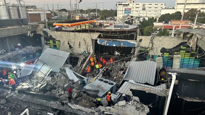 Rescue workers search for survivors at the Jet Set nightclub after its roof collapsed during a concert in Santo Domingo, Dominican Republic. (AP) Rescue workers search for survivors at the Jet Set nightclub after its roof collapsed during a concert in Santo Domingo, Dominican Republic. (AP)