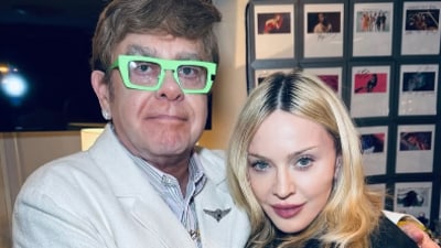 Madonna poses with Elton John as they end their decade-long feud. Madonna poses with Elton John as they end their decade-long feud.