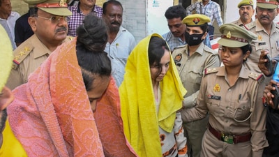 Police take away Saurabh Rajput's wife Muskan and Sahil Shukla after they were arrested in connection with his murder. (File) (HT_PRINT) Police take away Saurabh Rajput's wife Muskan and Sahil Shukla after they were arrested in connection with his murder. (File) (HT_PRINT)