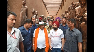 Punjab governor Gulab Chand Kataria along with Rajya Sabha MP Vikramjit Singh Sahneyat the Jallianwala Bagh in Amritsar on Tuesday. (Sameer Sehgal/HT) Punjab governor Gulab Chand Kataria along with Rajya Sabha MP Vikramjit Singh Sahneyat the Jallianwala Bagh in Amritsar on Tuesday. (Sameer Sehgal/HT)