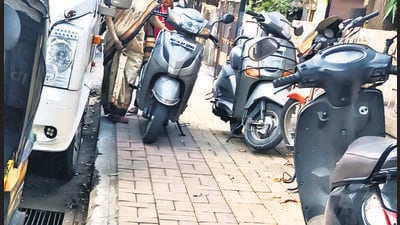 The PMC has been directed to devise and implement measures to relocate fuse boxes and other obstructions on footpaths “expeditiously, in a manner that does not hinder pedestrian movement.” (MAHENDRA KOLHE/HT PHOTO) The PMC has been directed to devise and implement measures to relocate fuse boxes and other obstructions on footpaths “expeditiously, in a manner that does not hinder pedestrian movement.” (MAHENDRA KOLHE/HT PHOTO)