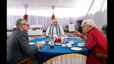 Union home minister Amit Shah along with Jammu and Kashmir lieutenant governor Manoj Sinha and chief minister Omar Abdullah in Srinagar on Tuesday. (ANI) Union home minister Amit Shah along with Jammu and Kashmir lieutenant governor Manoj Sinha and chief minister Omar Abdullah in Srinagar on Tuesday. (ANI)