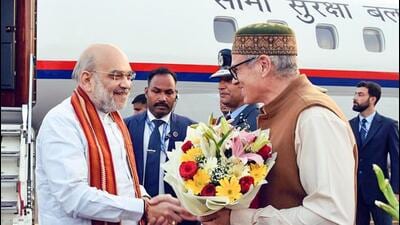 Union home minister Amit Shah being welcomed by Jammu and Kashmir chief minister Omar Abdullah on his arrival in Srinagar on Monday. (ANI Photo) Union home minister Amit Shah being welcomed by Jammu and Kashmir chief minister Omar Abdullah on his arrival in Srinagar on Monday. (ANI Photo)