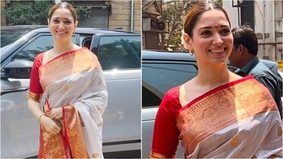 Tamannaah Bhatia stuns in elegant red and white saree for temple visit. (Instagram) Tamannaah Bhatia stuns in elegant red and white saree for temple visit. (Instagram)