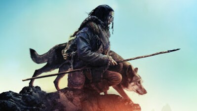 Alpha, a prehistoric adventure film released in 2018, was directed by Albert Hughes and penned by Daniele Sebastian Wiedenhaupt, based on a story by Hughes. The movie features Kodi Smit-McPhee in the role of a young hunter who forms a bond with an injured wolf during the last ice age, alongside Jóhannes Haukur Jóhannesson portraying his father. (Columbia Pictures)