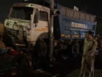 Police officials at the site of the accident.