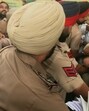 Dismissed police constable Amandeep Kaur being taken to a court in Bathinda on Tuesday. Dismissed police constable Amandeep Kaur being taken to a court in Bathinda on Tuesday.