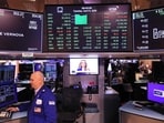 Traders work on the floor of the New York Stock Exchange during morning trading on April 08, 2025 in New York City.