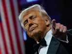 US President Donald Trump gestures as he attends the National Republican Congressional Committee (NRCC) dinner at the National Building Museum in Washington, DC.
