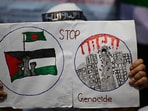 A student holds a banner during a protest against the attacks on Gaza by Israel, in Dhaka, Bangladesh, Monday, April 7, 2025. A student holds a banner during a protest against the attacks on Gaza by Israel, in Dhaka, Bangladesh, Monday, April 7, 2025.
