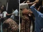 A viral video showed a group of people attacking the two women with sticks. A viral video showed a group of people attacking the two women with sticks.