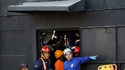 Rescue workers search for survivors at the Jet Set nightclub after its roof collapsed during a merengue concert in Santo Domingo. (AP) Rescue workers search for survivors at the Jet Set nightclub after its roof collapsed during a merengue concert in Santo Domingo. (AP)