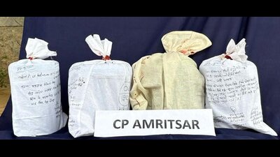 Amritsar police recovered 4.04 kg of heroin from the accused on Wednesday. Amritsar police recovered 4.04 kg of heroin from the accused on Wednesday.