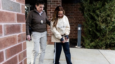 Suspended District Judge Sonya McKnight leaves the Susquehanna Twp. Police Department. (AP) Suspended District Judge Sonya McKnight leaves the Susquehanna Twp. Police Department. (AP)