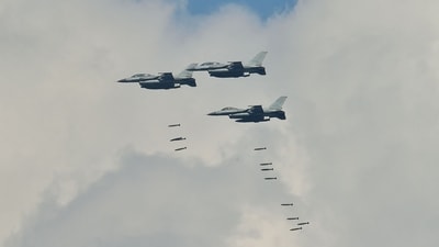 This picture taken on August 28, 2015 shows South Korean KF-16 fighter jets dropping bombs on a mountain target during a joint live firing drill between South Korea and the US at the Seungjin Fire Training Field in Pocheon. (AFP FILE/ Representative image ) This picture taken on August 28, 2015 shows South Korean KF-16 fighter jets dropping bombs on a mountain target during a joint live firing drill between South Korea and the US at the Seungjin Fire Training Field in Pocheon. (AFP FILE/ Representative image )
