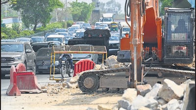 Slow-moving traffic due to construction work at Dhaula Kuan, Ring Road, on Tuesday. (RAJ K RAJ /HT PHOTO) Slow-moving traffic due to construction work at Dhaula Kuan, Ring Road, on Tuesday. (RAJ K RAJ /HT PHOTO)