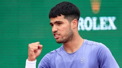 Spain's Carlos Alcaraz reacts after a point (AFP)