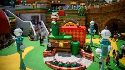 Guests walk through the Super Nintendo World area, at the Epic Universe theme park in Orlando, Florida, US, on Saturday, April 5, 2025. Photographer: Thomas Simonetti/Bloomberg (Bloomberg)