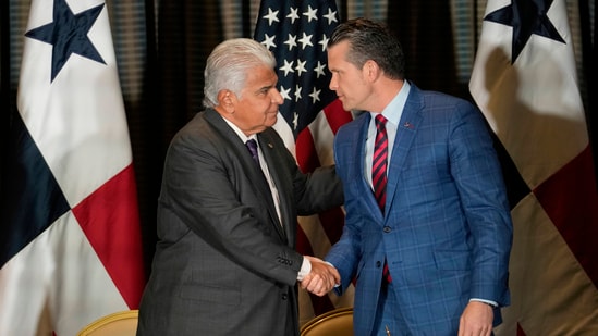 Panamanian President Jose Raul Mulino, left, shakes hand with U.S. Defense Secretary Pete Hegseth at an agreement signing ceremony in Panama City, Wednesday, April 9, 2025. (AP Photo/Matias Delacroix) (AP)