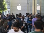 People wait in line outside an Apple Store at The Grove in Los Angeles People wait in line outside an Apple Store at The Grove in Los Angeles